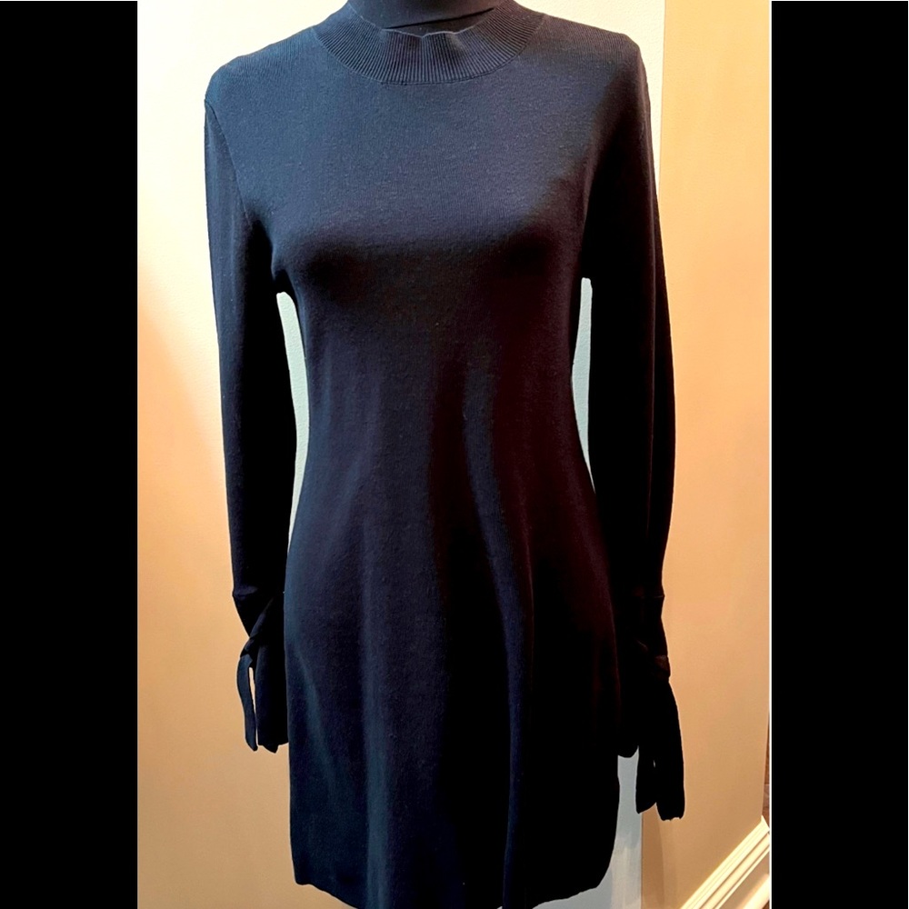 Evie Bell sleeve black knit dress by Swank. SzM